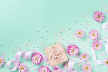 Flowers composition with hearts and gift box