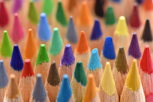 Color pencils, macro. Bright background. Stationery for drawing.
