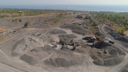 Heavy machinery at gravel and sand quarry. extraction volcanic sand at sorting crushing complex. rock crushing and screening equipment Agung, Bali, Indonesia