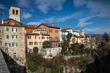 Fototapeta na wymiar town of cividale del friuli in sunny winter, view from bridge ponte del diavolo, italy