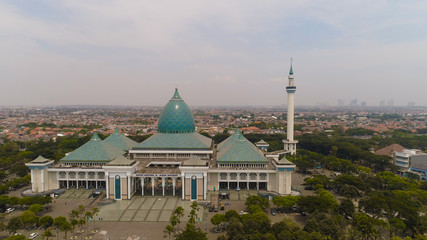 aerial view mosque in Indonesia Al Akbar in Surabaya, Indonesia. beautiful mosque with minarets on island Java Indonesia. mosque in an asian city