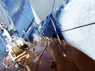 Sailing yacht on open sea in storm