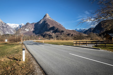 beautiful empty mountain road leading to mountain Mangart in julian alps, Slovenia