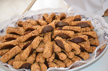 Dish with fresh baked Moroccan cookies served with tea- biscuit for wedding
