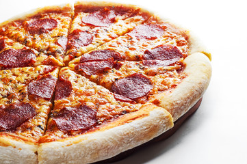 Pepperoni Pizza with Mozzarella cheese, salami, Tomatoes, pepper. Italian pizza isolated on white background.