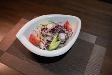 Close up view of plate with japanese food inside. Japan traditional food on wooden table. Selective focus