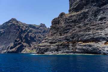 Fototapeta na wymiar Vertical cliffs Acantilados de Los Gigantes (Cliffs of the Giants). View from Atlantic Ocean. Tenerife. Canary Islands. Spain.