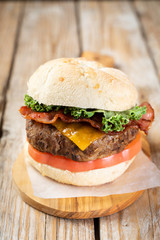 tasty grilled beef chicken burger sandwich salad garnish bun