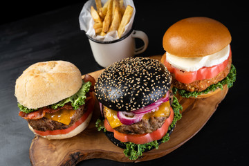 tasty grilled beef chicken burger sandwich salad garnish bun