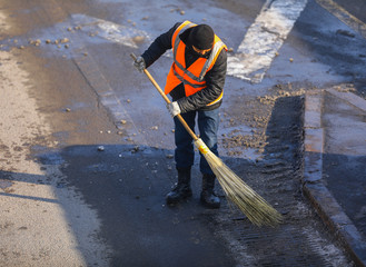 street sweeper sweeping the street