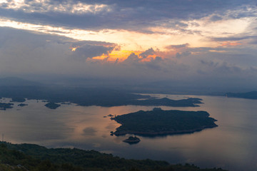 view of sunrise over the lake in montenegro