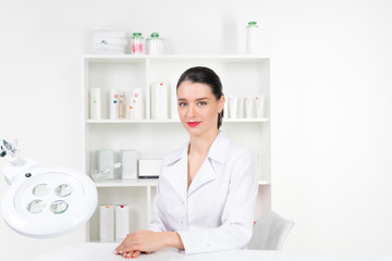 Woman beautician doctor at work in spa center. Portrait of a young female professional cosmetologist. Female employee in cosmetology cabinet or beauty parlor. Healthcare occupation, medical career