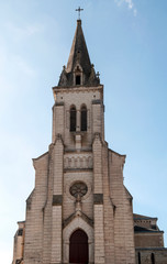 Fototapeta na wymiar Gothic church in Aquitaine in France on a cloudy day