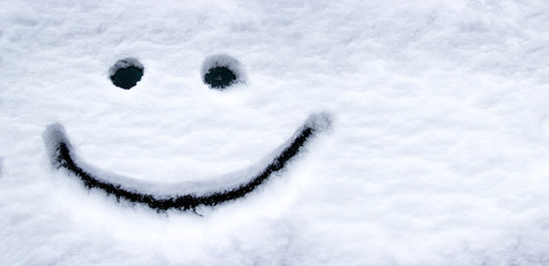 smiling face in the snow eyes and mouth smile