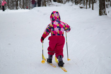 Little girl skiing