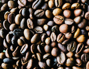 baked coffee beans texture background concept of a morning freshness
