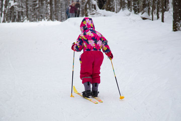 Little girl skiing