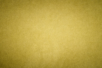 Textured background surface of textile upholstery furniture close-up. yellow Color fabric structure