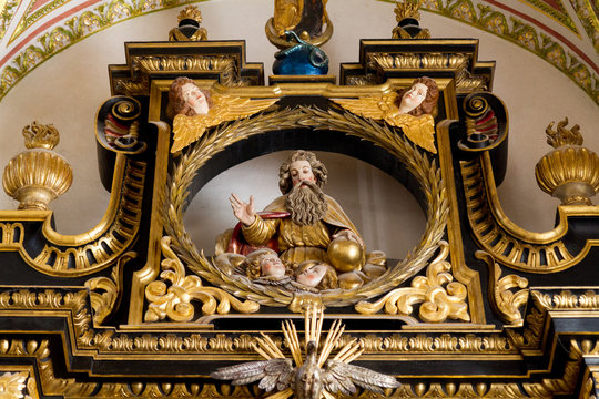 Trnava, Slovakia. 2018/4/12. A statue of God the Father in reredos (raredos), i.e. a large altarpiece. The Saint John the Baptist Cathedral in Trnava.