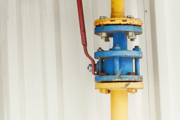 winter is on the street. crane for shutting off gas in the living room. valve stem and rusty