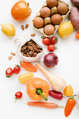 Vegetables on white background flat lay top view. Healthy food concept with copy space for text