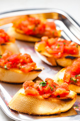 roasted baguette with tomatoes and basil
