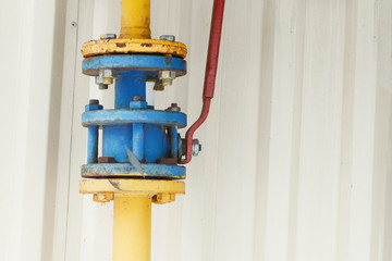 winter is on the street. crane for shutting off gas in the living room. valve stem and rusty