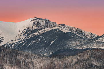 Fototapeta na wymiar Tatra mountains landscape, winter sunrise over Kasprowy Wierch
