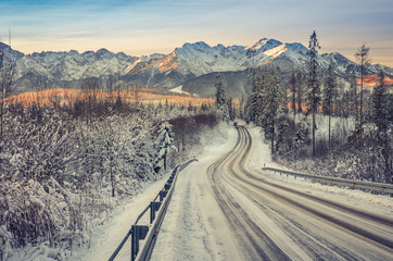 Winter road landscape, snowy Tatra mountains, Poland