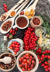 Medicinal tablets and pills and herbs composition: Dog rose, bunch branch Rosehips, types Rosa canina hips, essential oil. bunch, dried flowers of linden and chamomile elderberries and goji berries. 