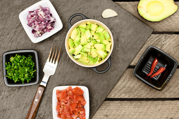 Avocado, onion, tomaten, chili, ingredients for guacomole