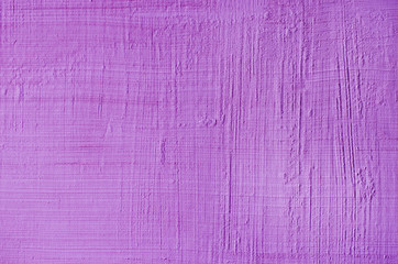 purple textured putty close-up. Vintage or grunge background texture Venetian stucco in the pattern...