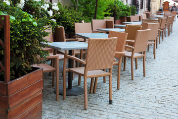 Fototapeta na wymiar restaurant tables on the street