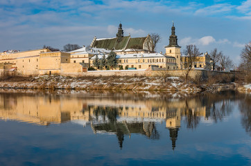 Fototapeta premium Krakow, Poland, winter landscape of Vistula river and Norbertine sisters monastery