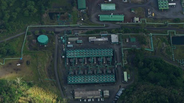 Aerial view Puna Geothermal plant nearby active volcano