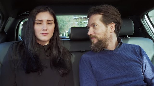 Man flirting with business partner in cab mobbing