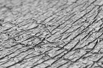 Foil coated thermal insulation material