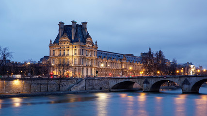 Paris, France - January 12, 2018: Louvre museum viewed from Orsay quay