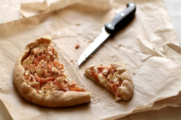 Tomato and feta cheese, seasoned with smoked pepper. Selective focus.