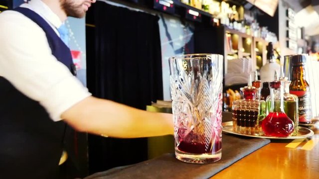 Bartender preparing lemonade in bar