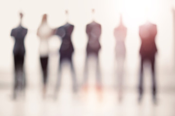business background.a group of business people standing in the o