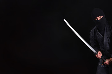 Ninja with katana cropped. Martial arts. © Dmytro