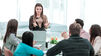 Manager conducts the presentation of the new advertising project of the company in the spacious office