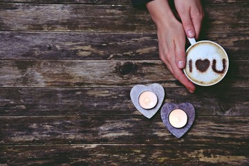 I Love You cup of coffee on the wooden background. Love cup of cappuccino isolated. Hygge style coffee drink