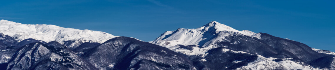 wide winter panorama of the Italian Marsicani mountain range