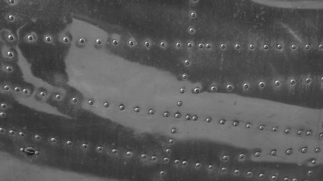 Detail of riveted metal exterior of Fairchild C-119 Flying Boxcar.
