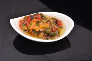 spicy sauce in a white bowl