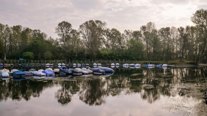 Boats moored in a harbour of the Ticino river