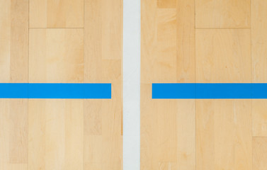 wooden floor badminton, futsal, handball, volleyball, football, soccer court. Wooden floor of sports hall with marking lines on wooden floor indoor, gym court