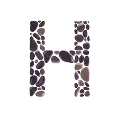 H Letter made of black beach stones isolated on white background